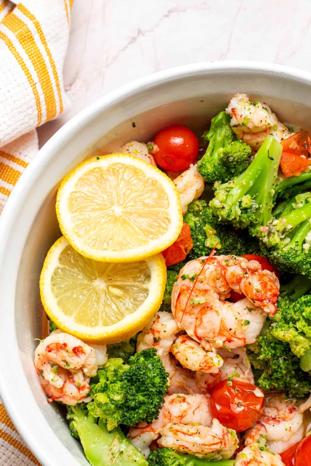 cooked Garlic Butter Shrimp & Broccoli on a white bowl