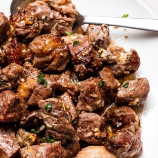 garlic butter steak bites on a plate close-up