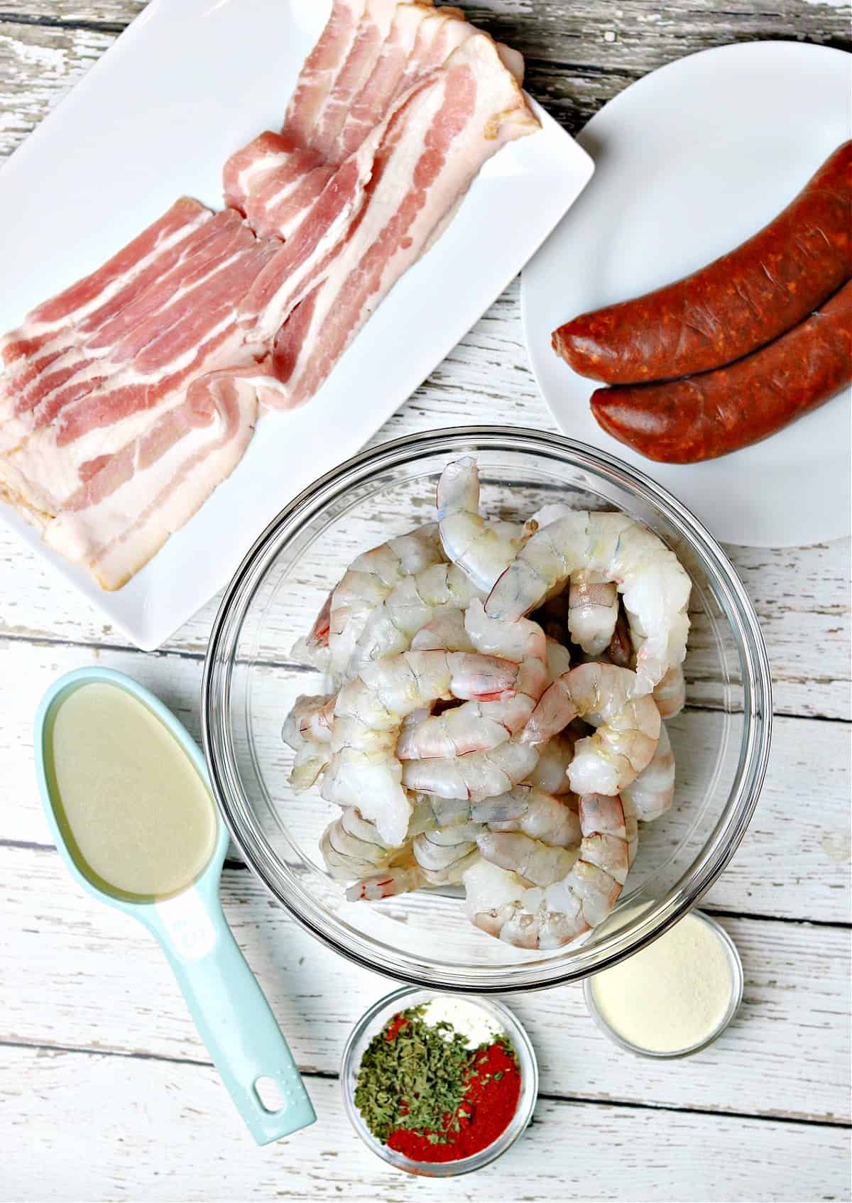 shrimp, sausage, cajun seasoning, broth, bacon and Xanthan Gum in separate bowls