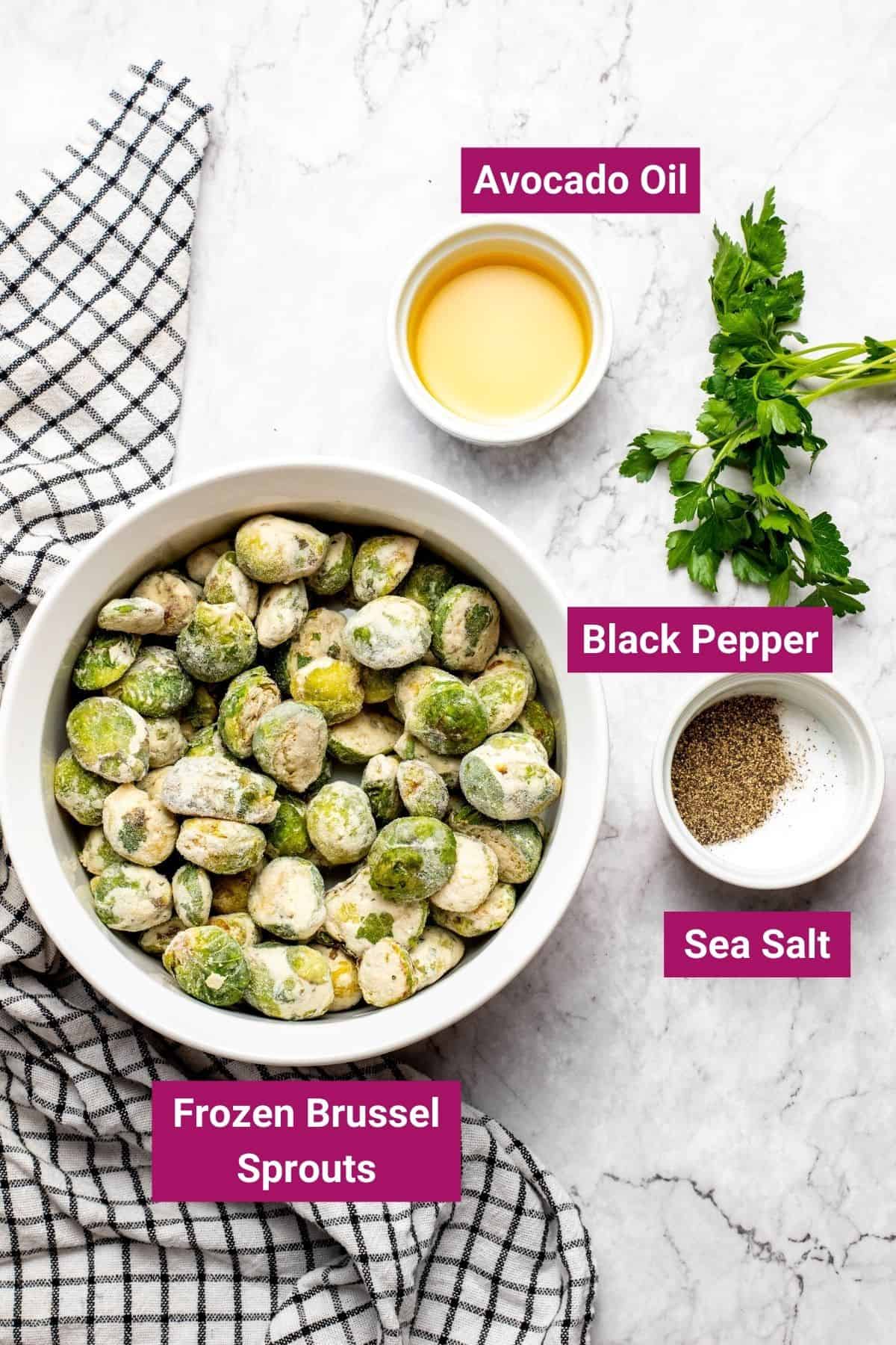 frozen brussel sprouts, sea salt, pepper and avocado oil on separate bowls
