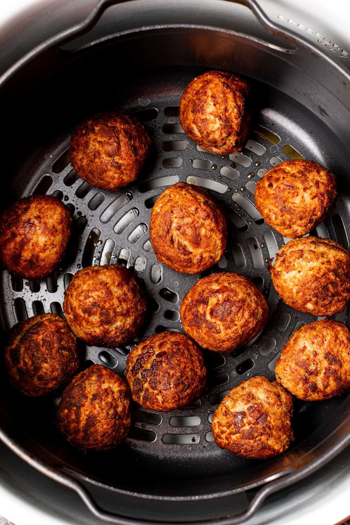 cooked frozen meatballs in the air fryer basket