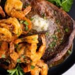 yummy air fryer cajun shrimp and steak on a plate