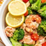 air fryer garlic butter shrimp and broccoli in a bowl