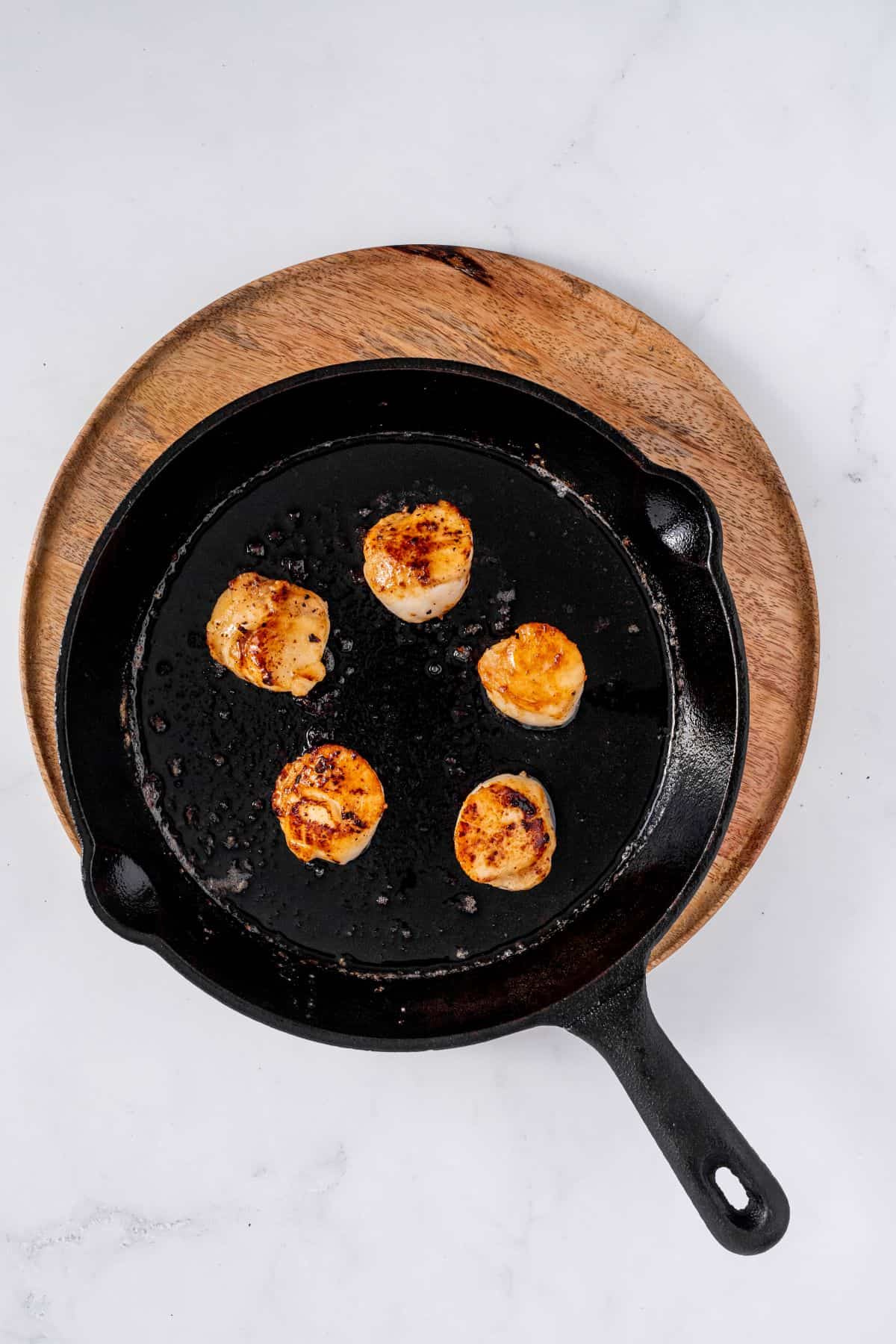 frying scallop on a pan