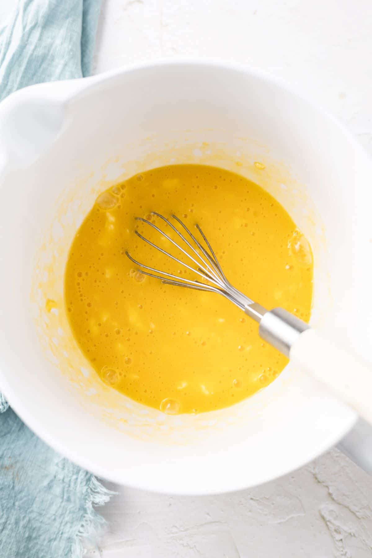 beating eggs on the bowl