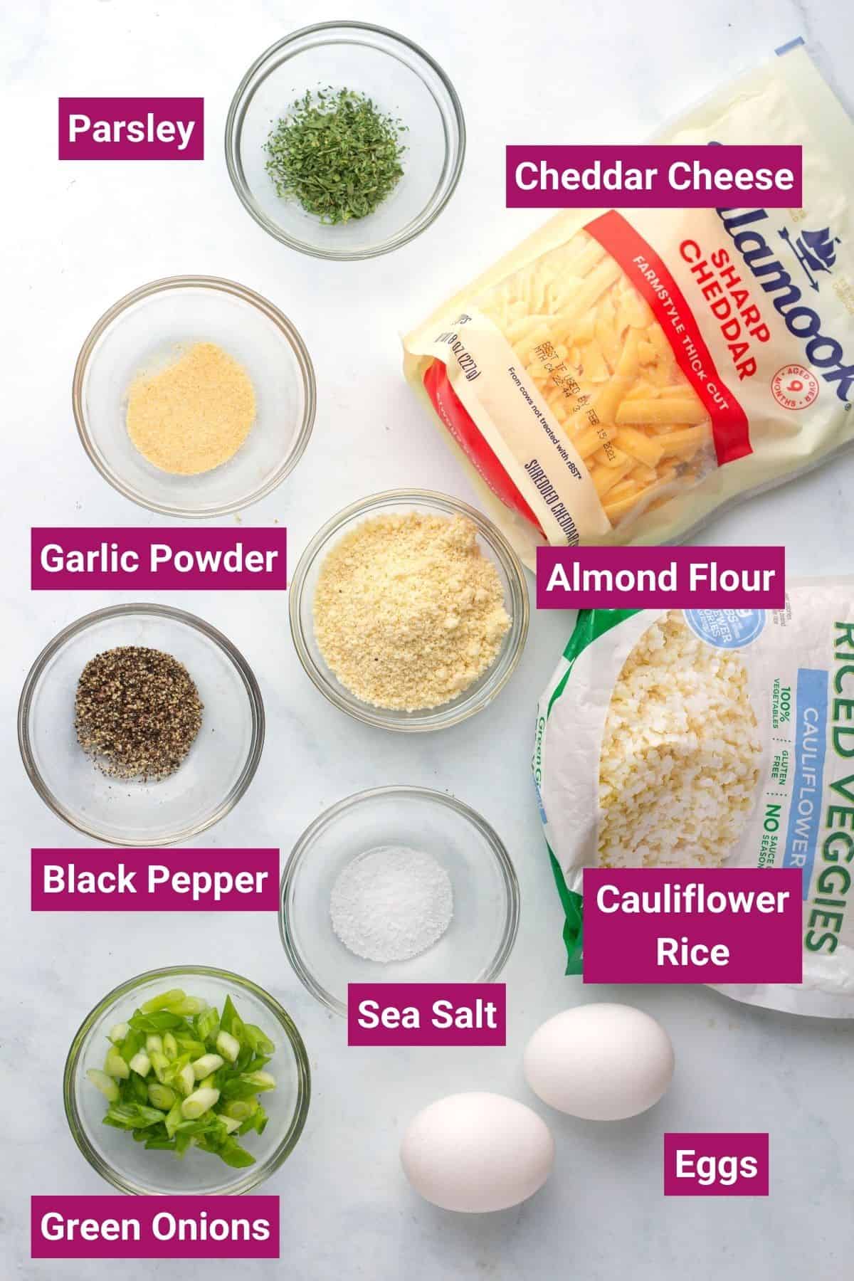 ingredients needed to make keto hash browns like cheddar cheese, parsley, almond flour, garlic powder, black pepper, sea salt, green onions, eggs and cauliflower rice