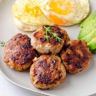 Chicken Sausages with fried eggs on the side