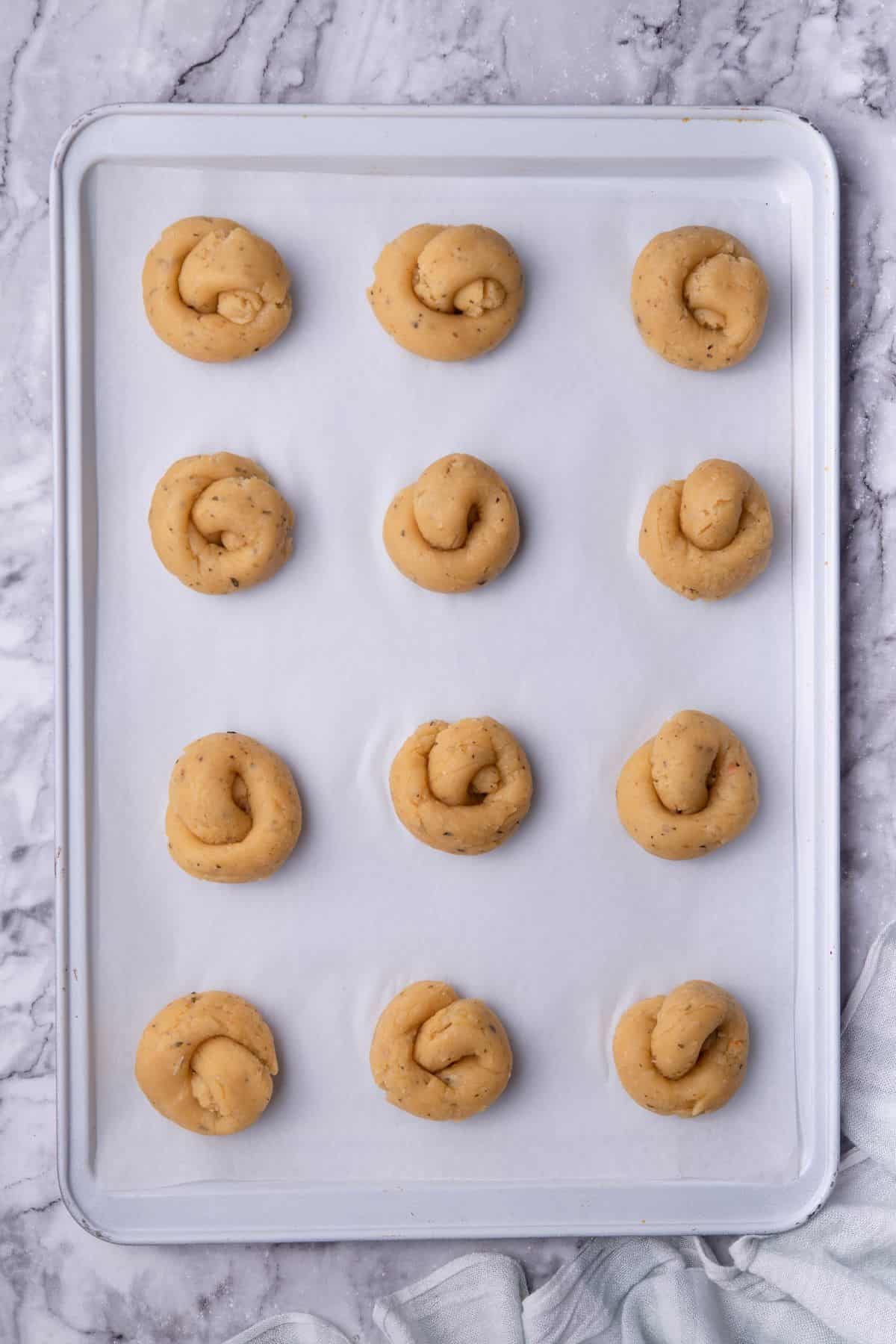 Garlic Bread knots on a baking pan