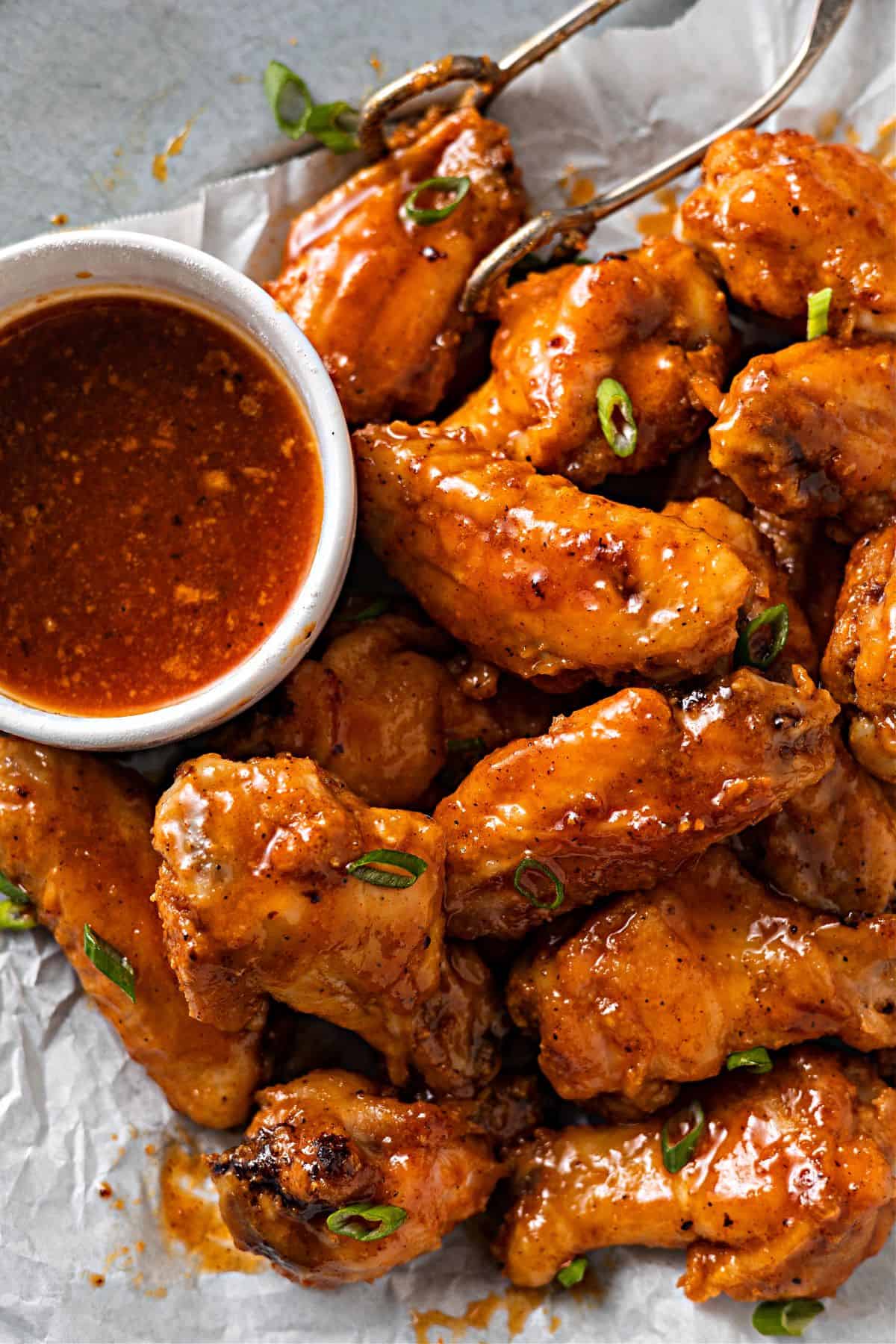 yummy Honey Sesame Ghost Pepper Wings on a parchment paper