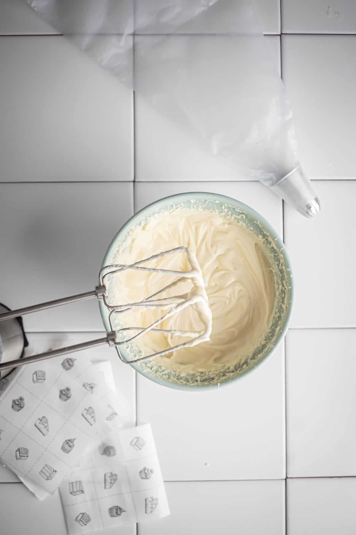 mixed keto cream cheese frosting on a bowl