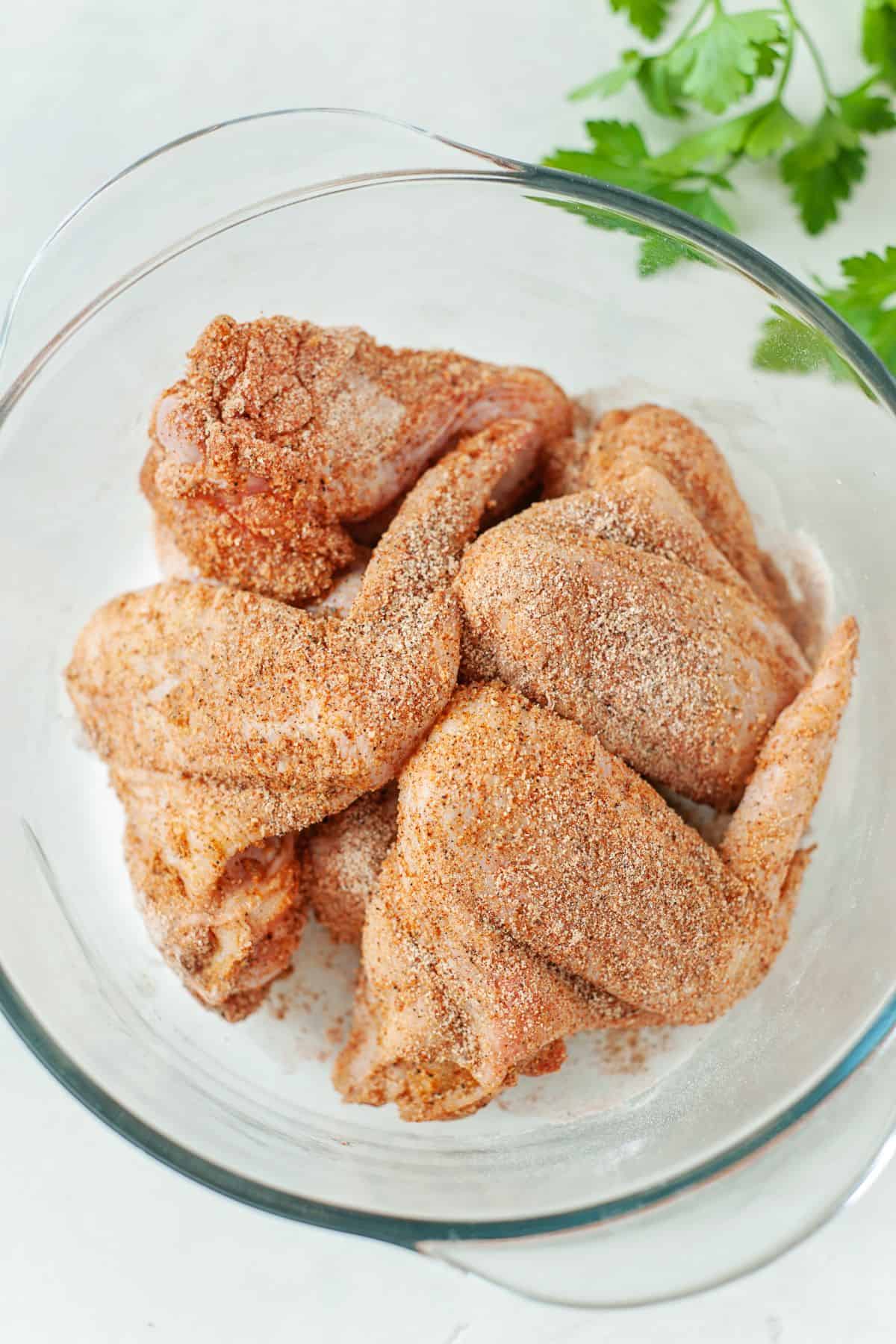 chicken wings with lemon seasoning on a bowl