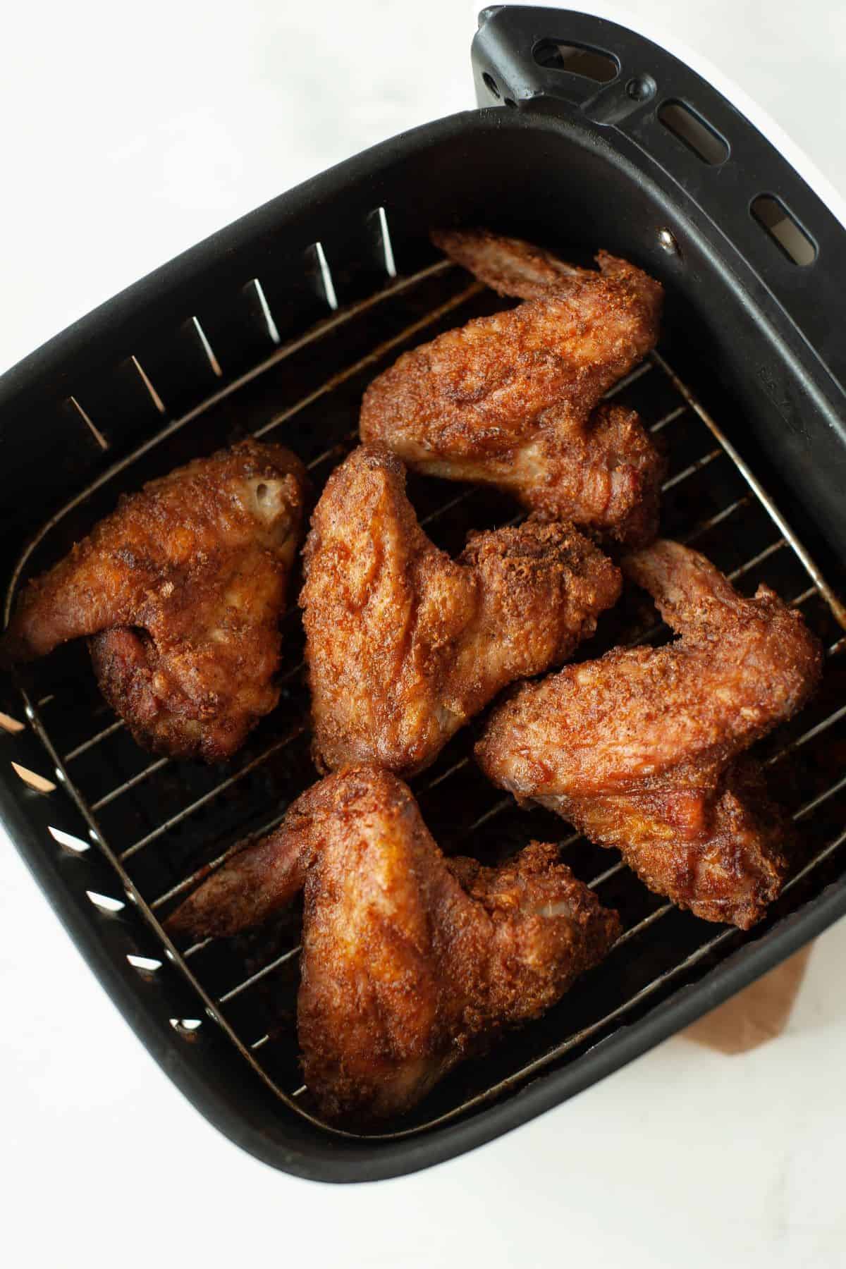 frying Lemon Pepper Wings in an air fryer
