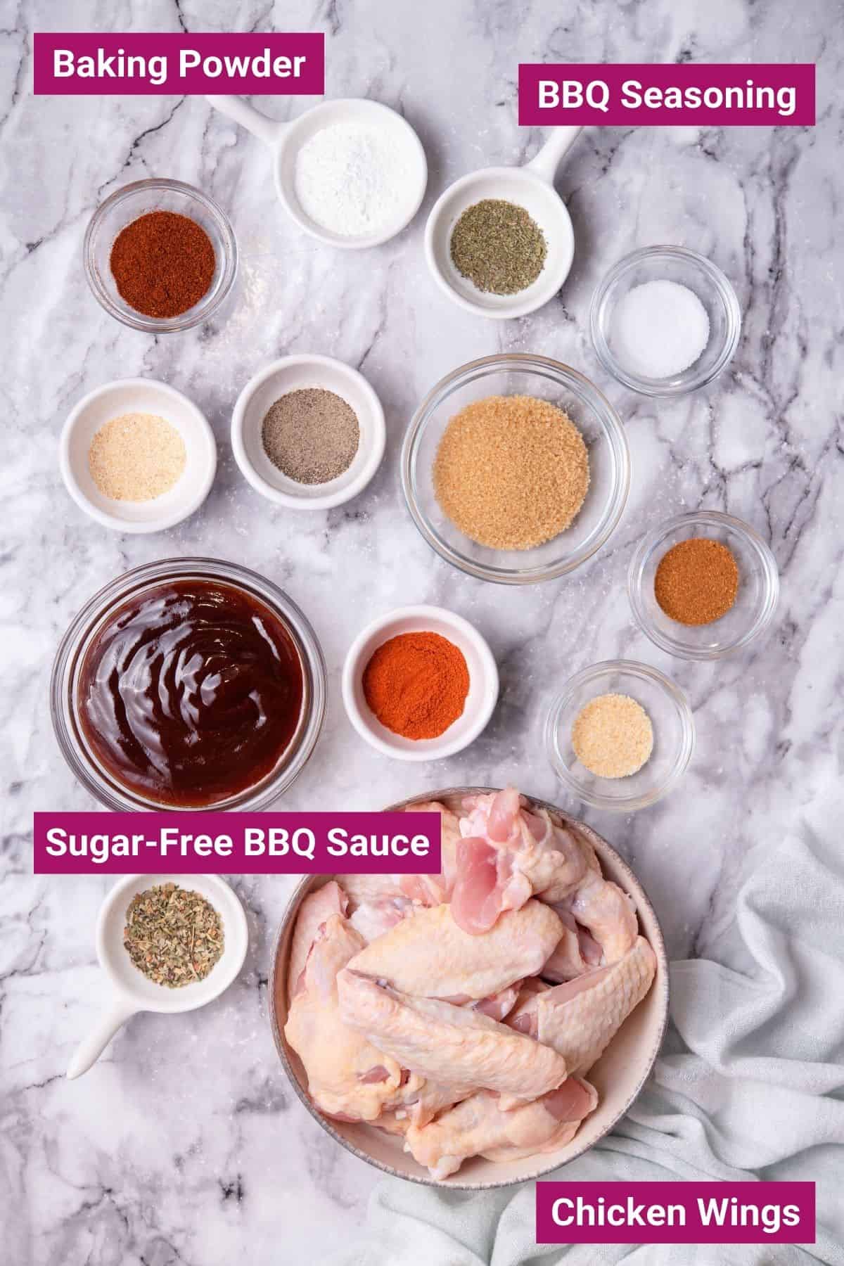 chicken wings, bbq sauce and bbq seasoning on separate bowls