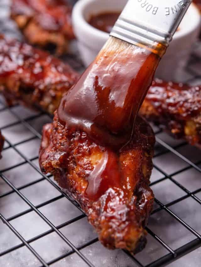 crispy baked bbq chicken wings on a cooling rack