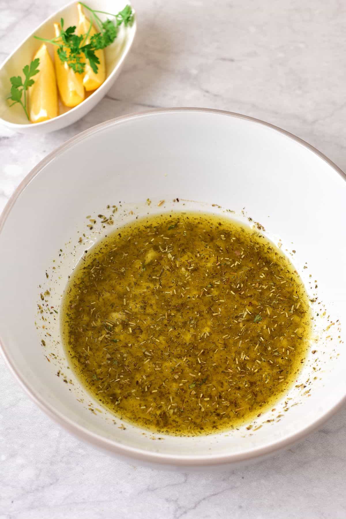 mixed lemon juice, spices and seasonings on a small bowl