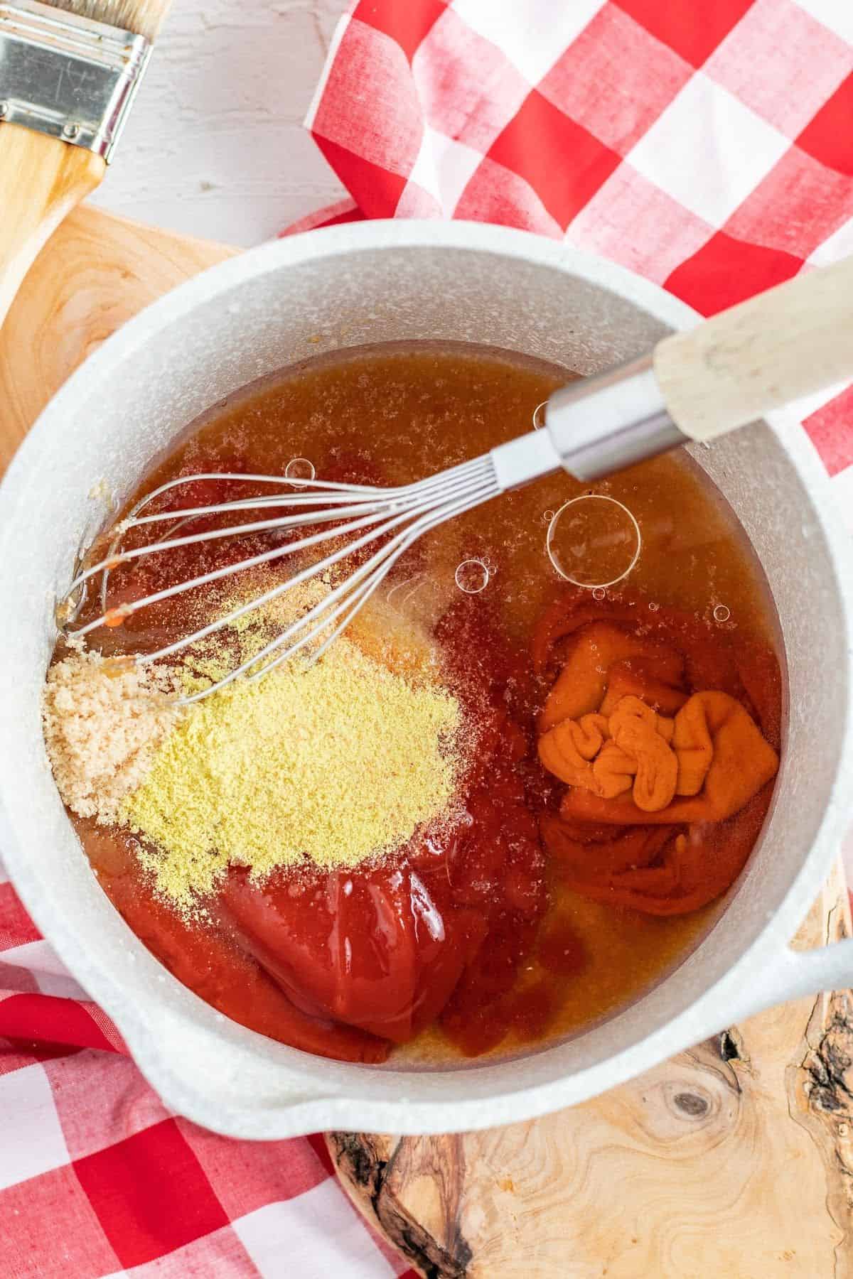 mixing spices and seasonings on a large round pan