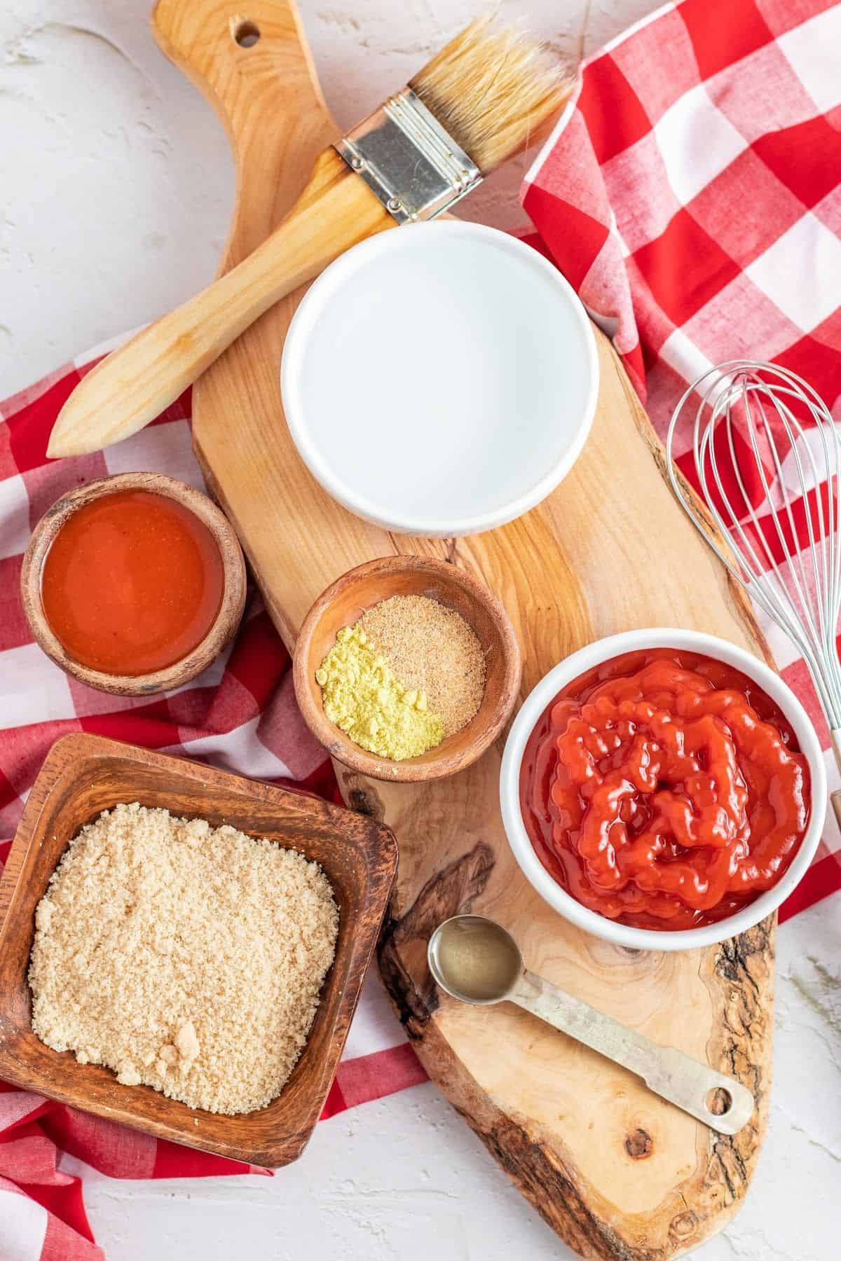 bbq sauce, different seasonings on a separate bowls