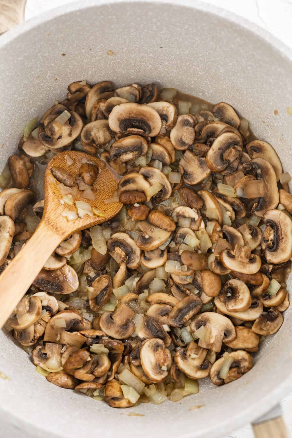 sautéing mushroom and garlic