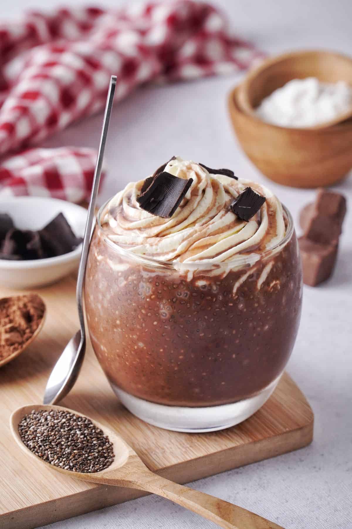 Chocolate Chia Seed Pudding keto topped with dark chocolate and whipped cream