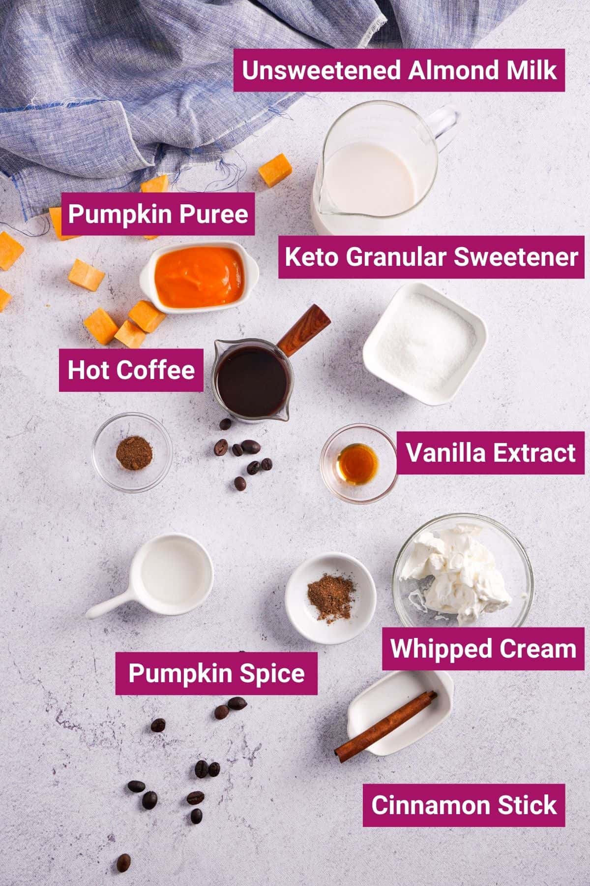 Unsweetened Almond Milk, Hot Coffee, Pumpkin Pie Spice, Vanilla Extract, Keto Granular Sweetener, Pumpkin Puree on separate bowls
