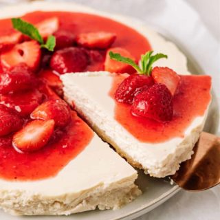 getting a slice of strawberry cheesecake
