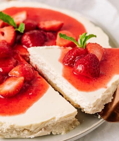 getting a slice of strawberry cheesecake