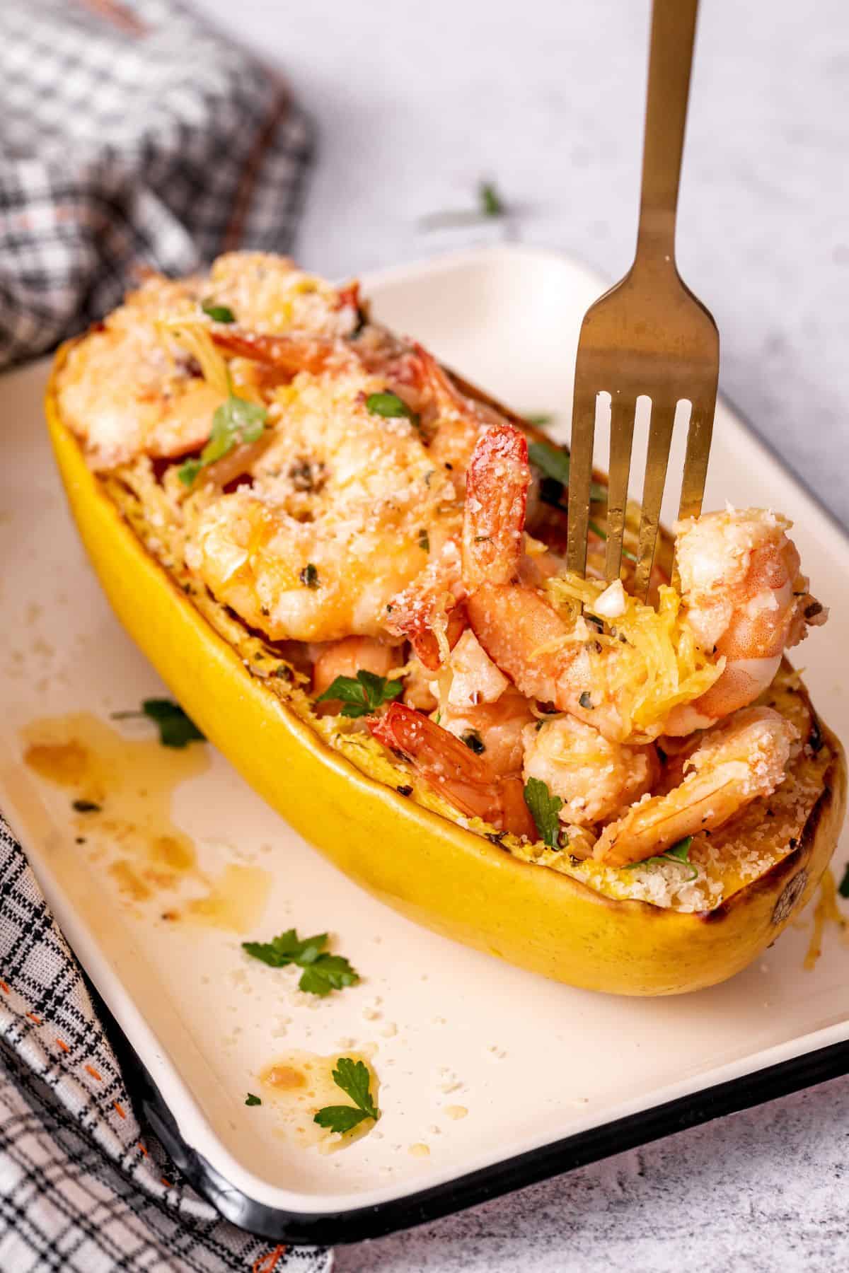 Spaghetti Squash with Shrimp Scampi on a plate with fork on it