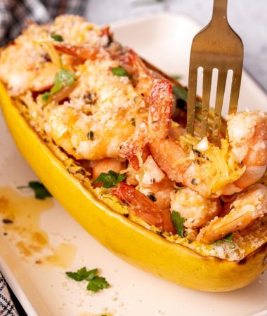 shrimp scampi with spaghetti squash on a plate