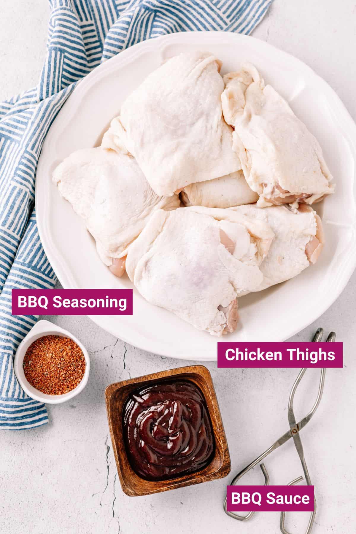 bbq seasoning, bbq sauce on separate containers and a few pieces of chicken thighs on a plate