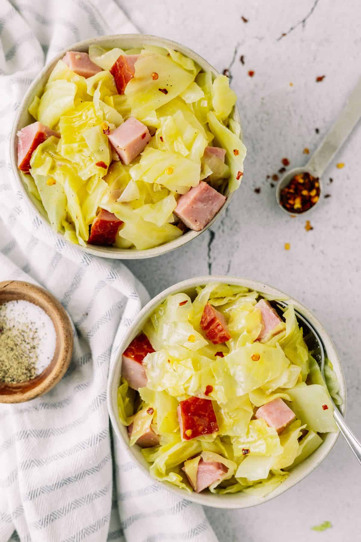 delicious Crockpot Cabbage on two serving bowls