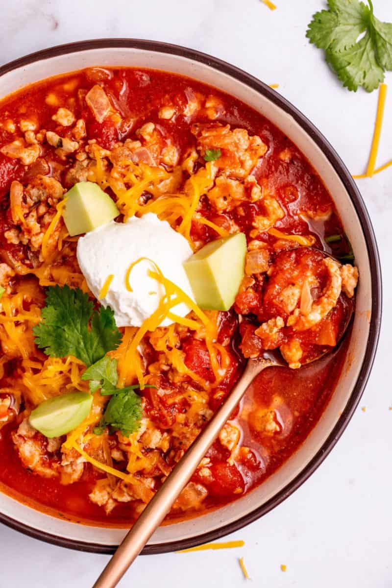Taco Soup with Ground Turkey on a large bowl with spoon