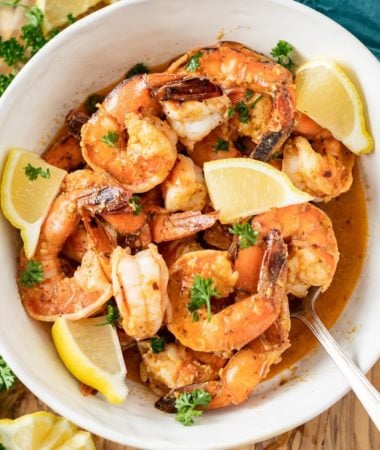 old bay shrimp with old bay garlic butter sauce in a bowl