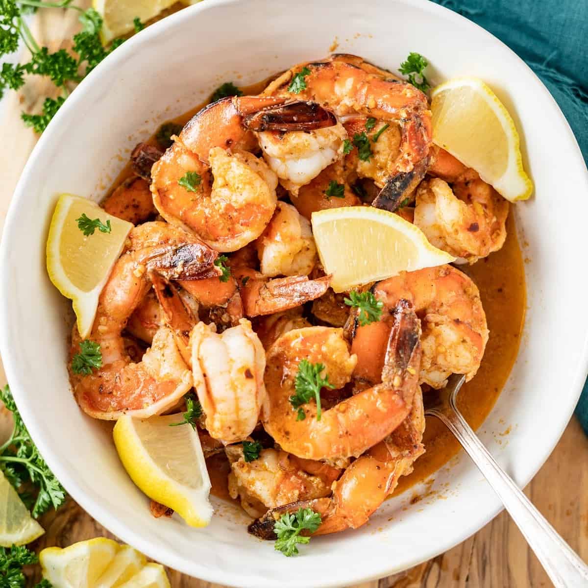 old bay shrimp with old bay garlic butter sauce in a bowl