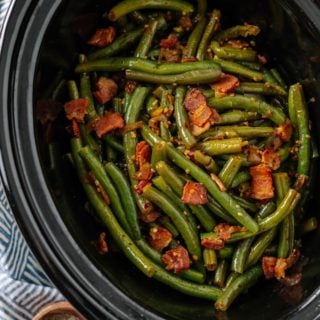 fresh green beans with bacon cooked in a crockpot slow cooker