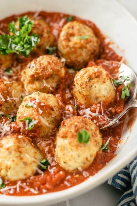 Delectably seasoned and cooked ground chicken meatballs, enticingly presented in a generous bowl
