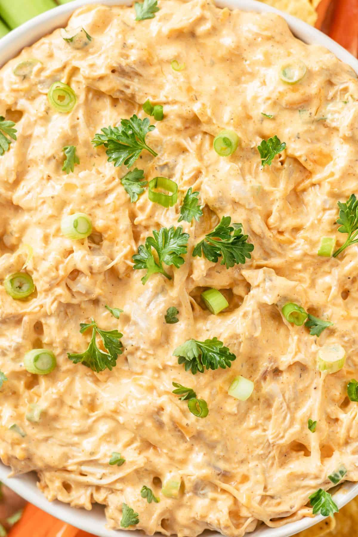 Generous bowl of luscious Keto Buffalo Chicken Dip, rich and creamy with a delightful blend of flavors