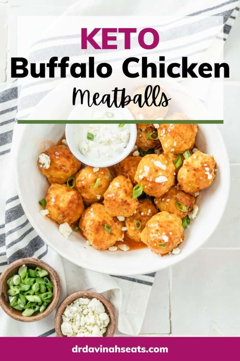 a bowl of buffalo chicken meatballs, blue cheese dressing, blue cheese crumbles, and green onions with text that says keto buffalo chicken meatballs