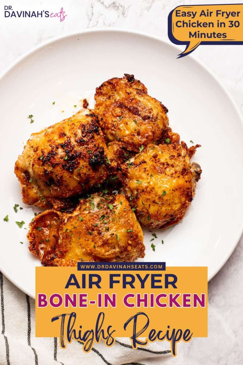 juicy bone-in air fryer chicken thighs sprinkled with parsley