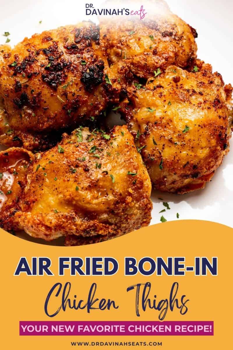 golden air fried bone-in chicken thighs topped with chopped parsley