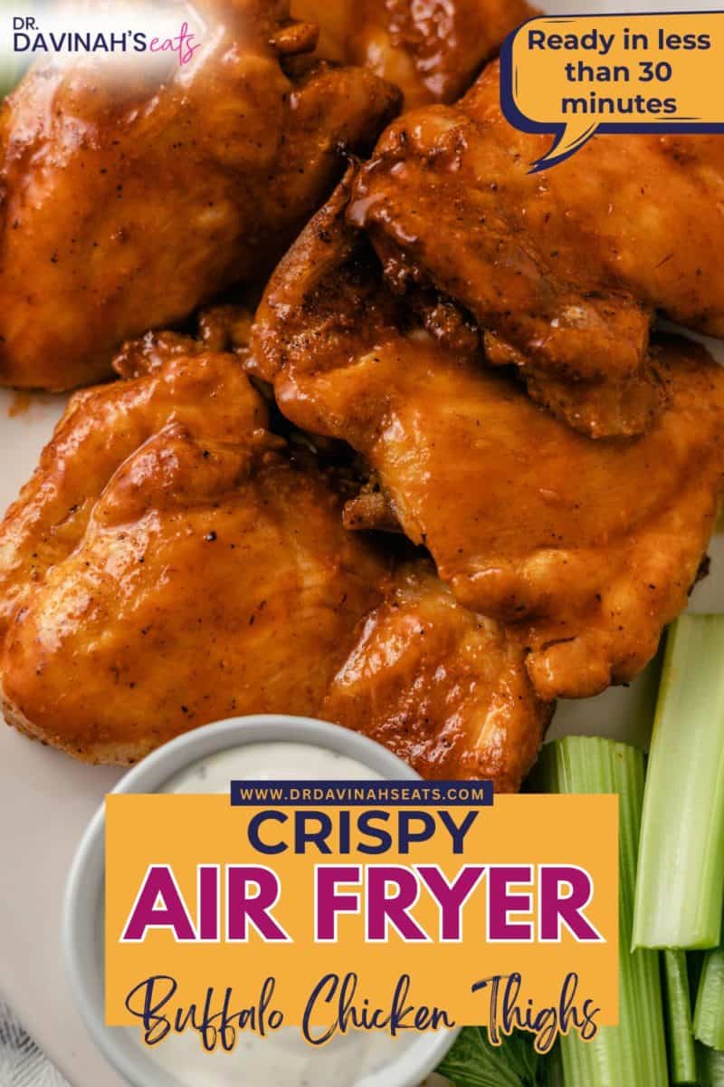crispy air fryer buffalo chicken thighs with a side of ranch dressing and celery sticks