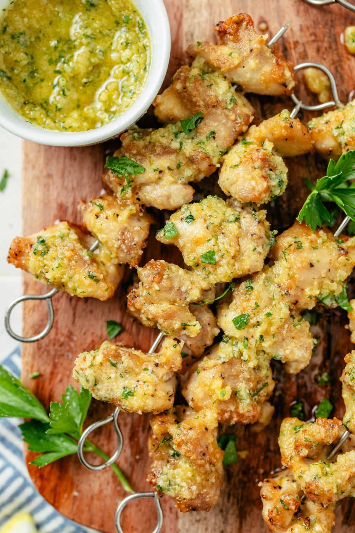 golden air fryer chicken skewers with garlic parmesan dipping sauce