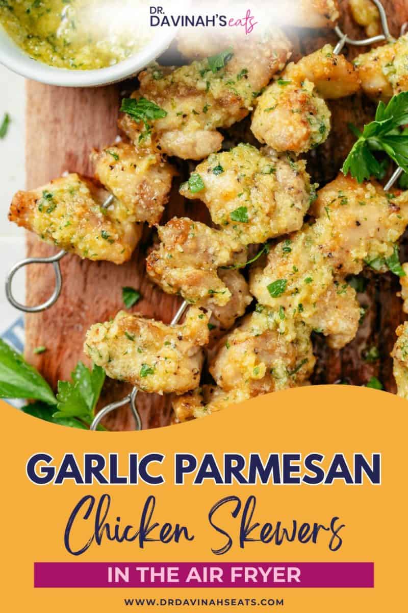 air fryer chicken skewers served alongside garlic parmesan sauce