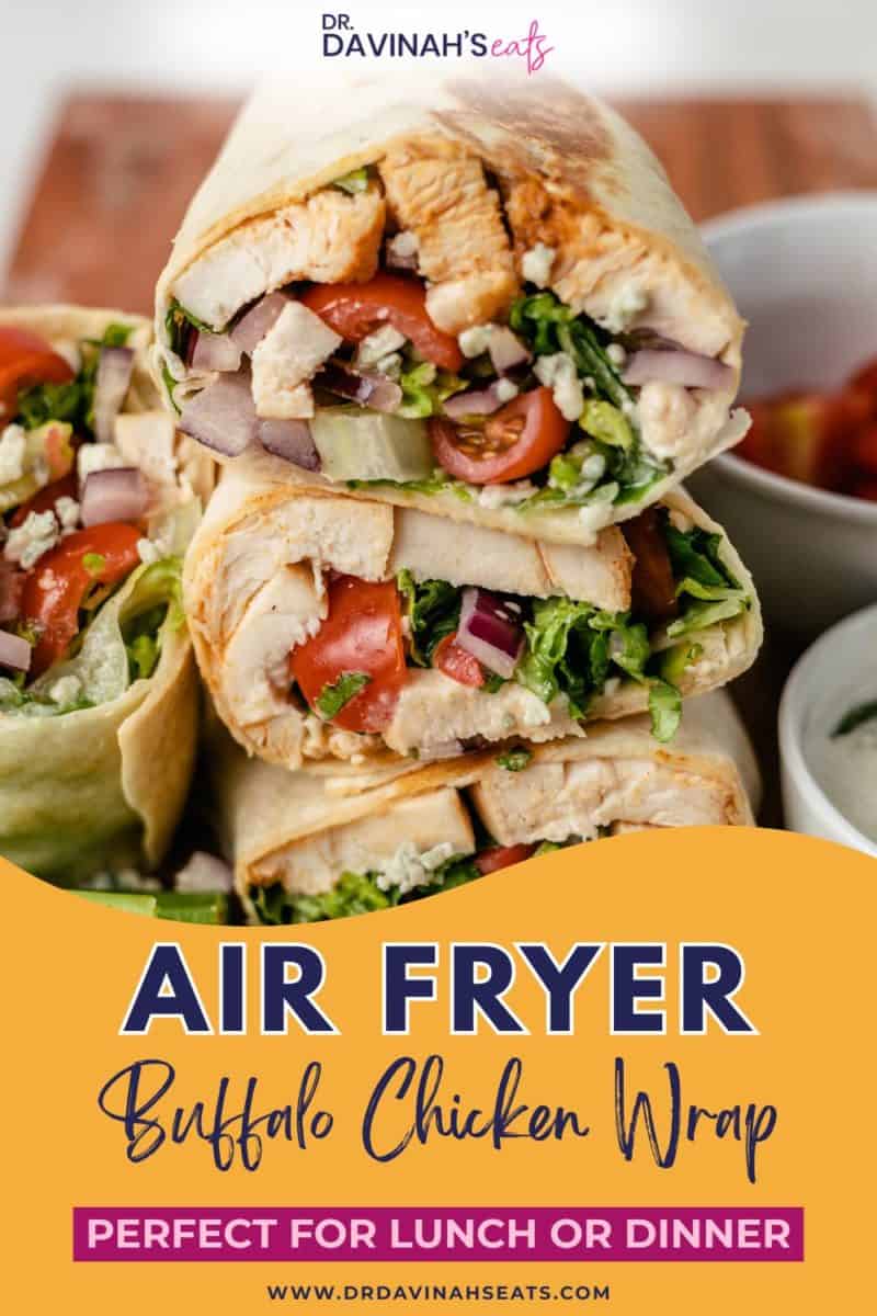 loaded buffalo chicken wraps served with celery sticks and blue cheese dip arranged in a wooden board