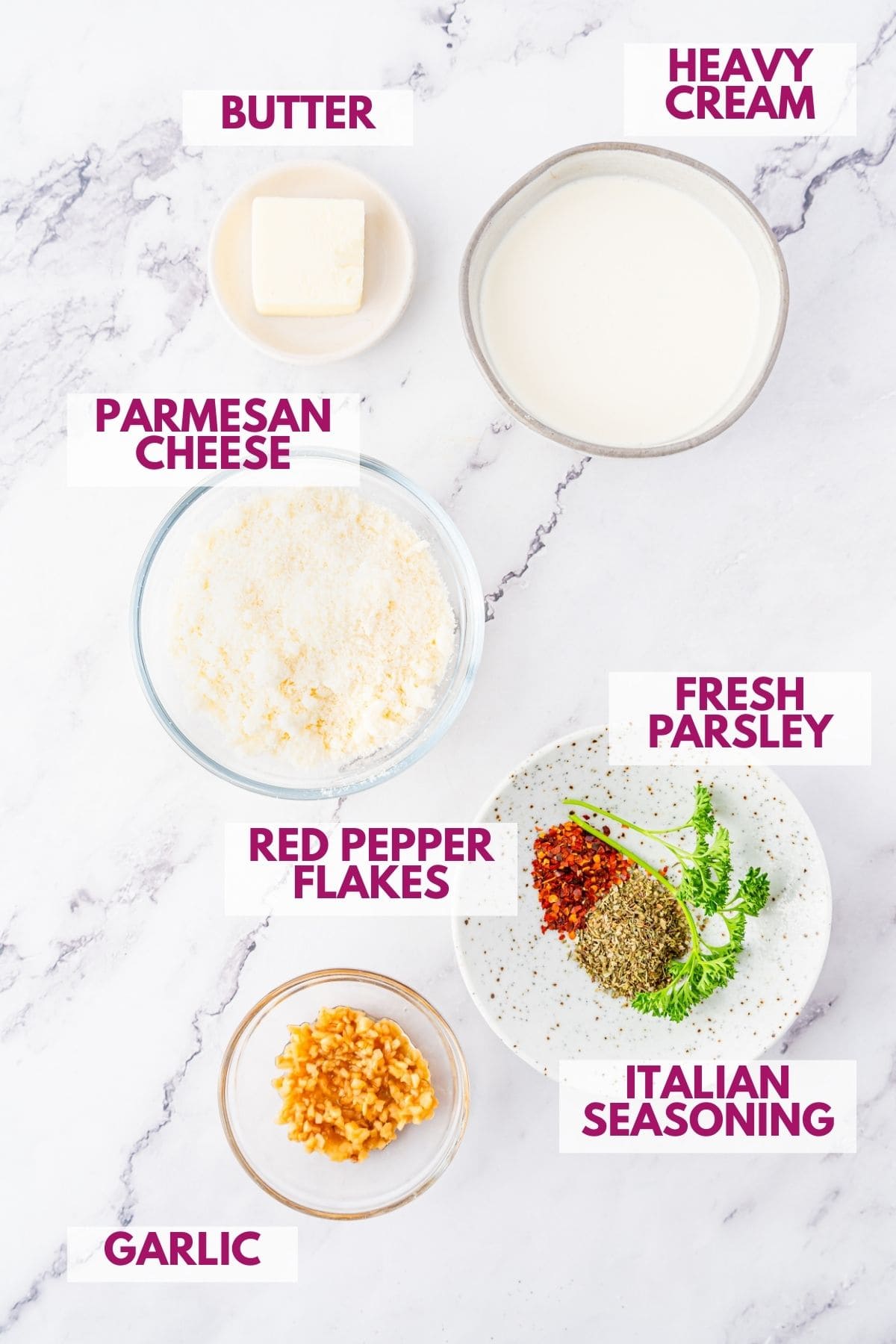 ingredients for creamy garlic parmesan sauce in separate bowls with text labels