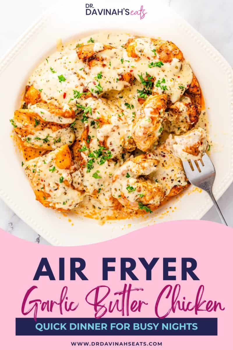 juicy garlic parmesan chicken thighs drizzled with creamy garlic parmesan sauce and parsley in a plate