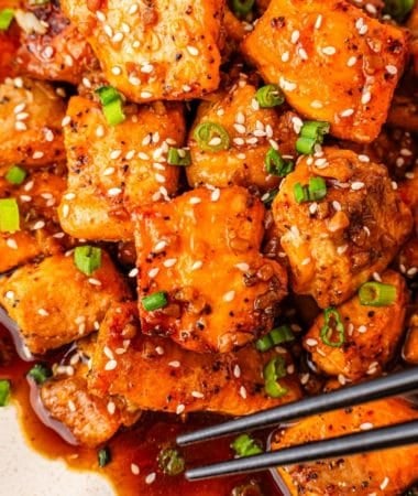 juicy honey garlic salmon bites coated with honey garlic sauce