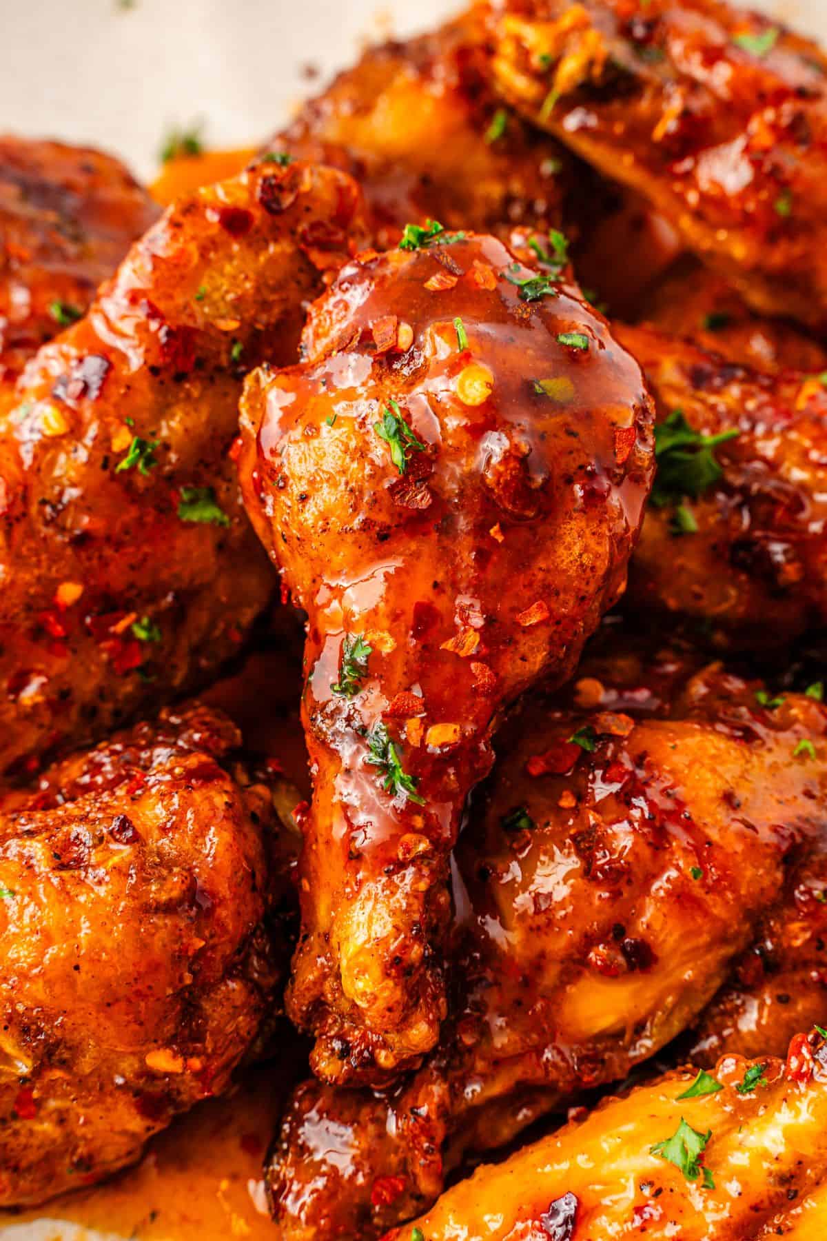 Crispy chicken wings tossed in sticky hot honey sauce