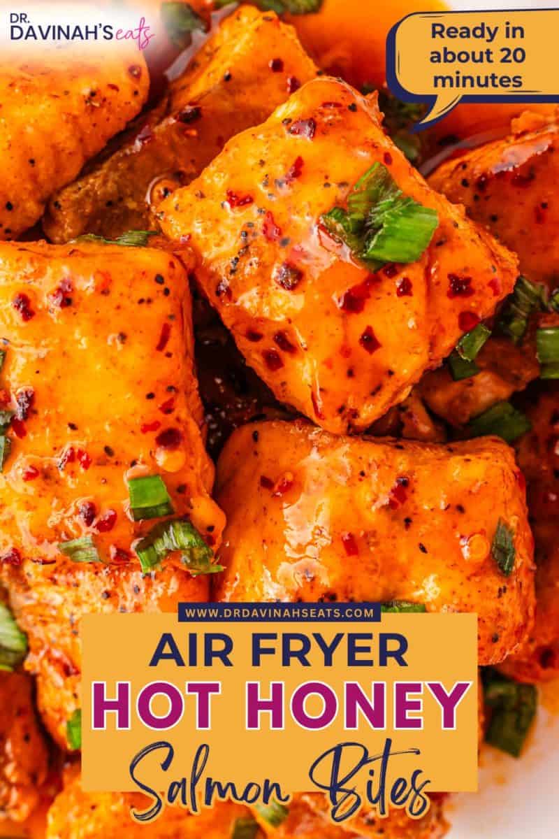 Glazed salmon bites coated in hot honey and topped with chopped green onions