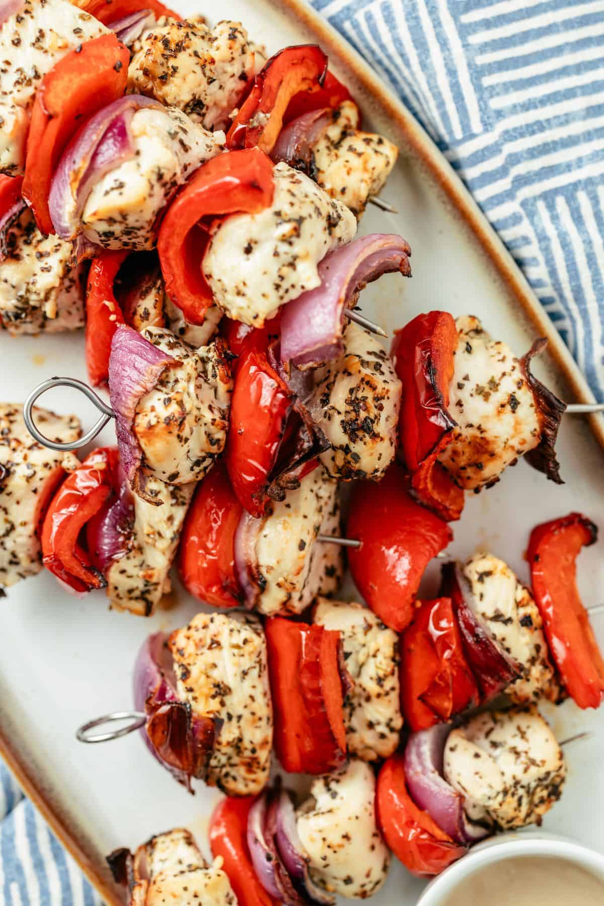 tender marinated chicken kabobs served on a plate
