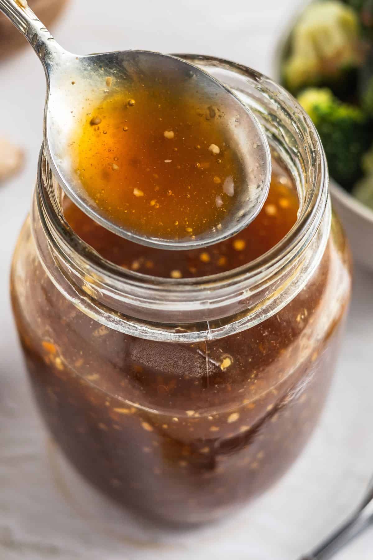 Clear mason jar filled with freshly cooked sugar-free teriyaki sauce